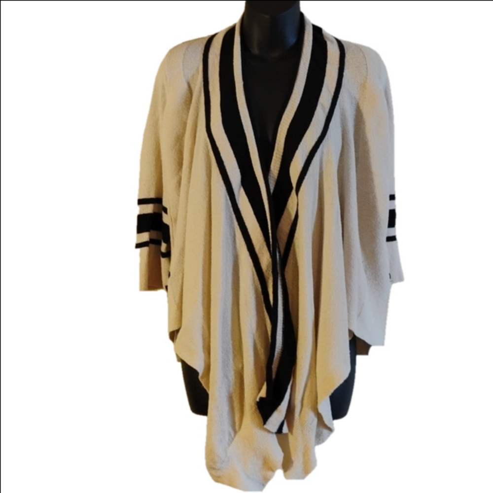 Sparrow size small cream/ black sweater. Wrap around style.